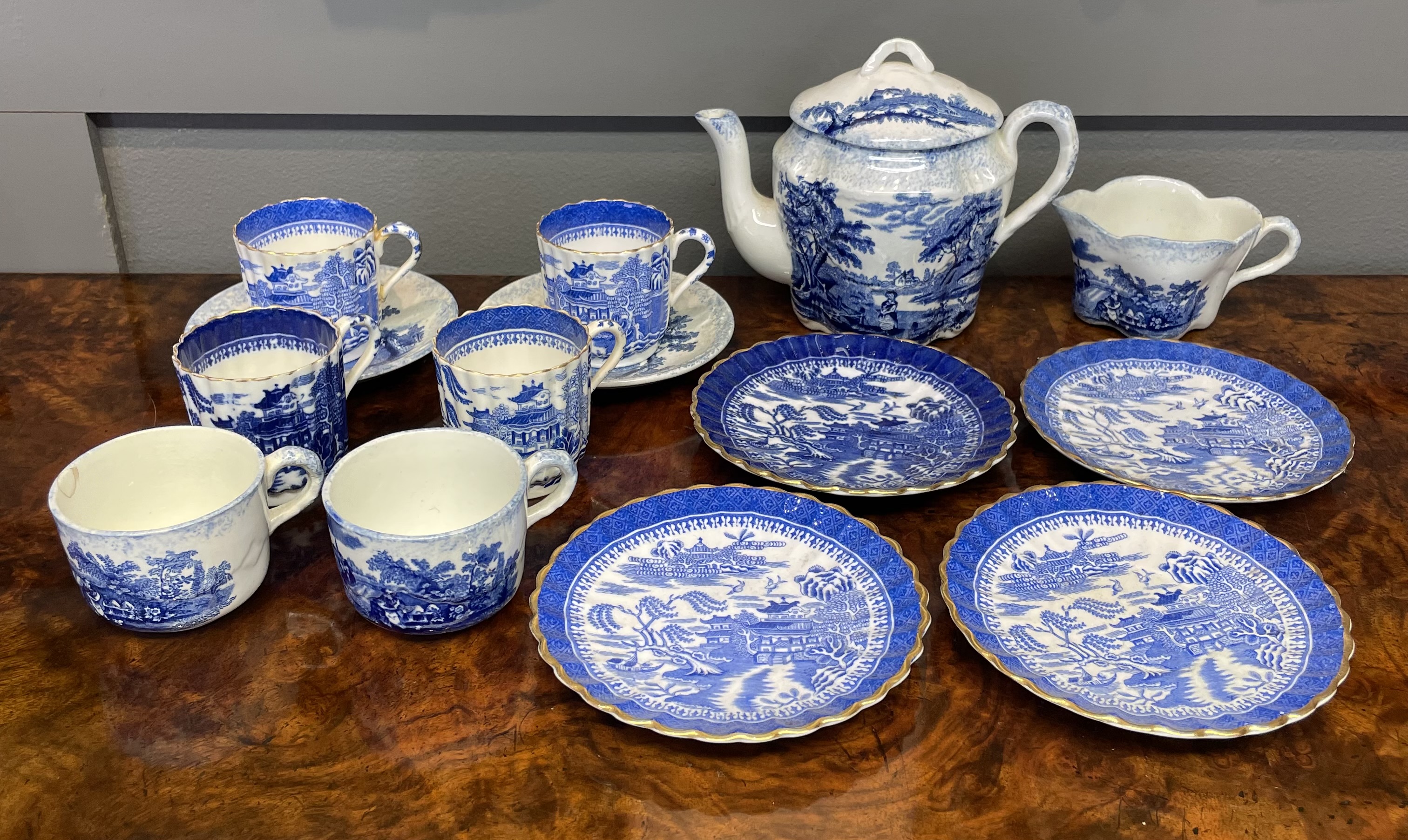 A Collection of Scenic Blue and White Transferware Childs Tea Set