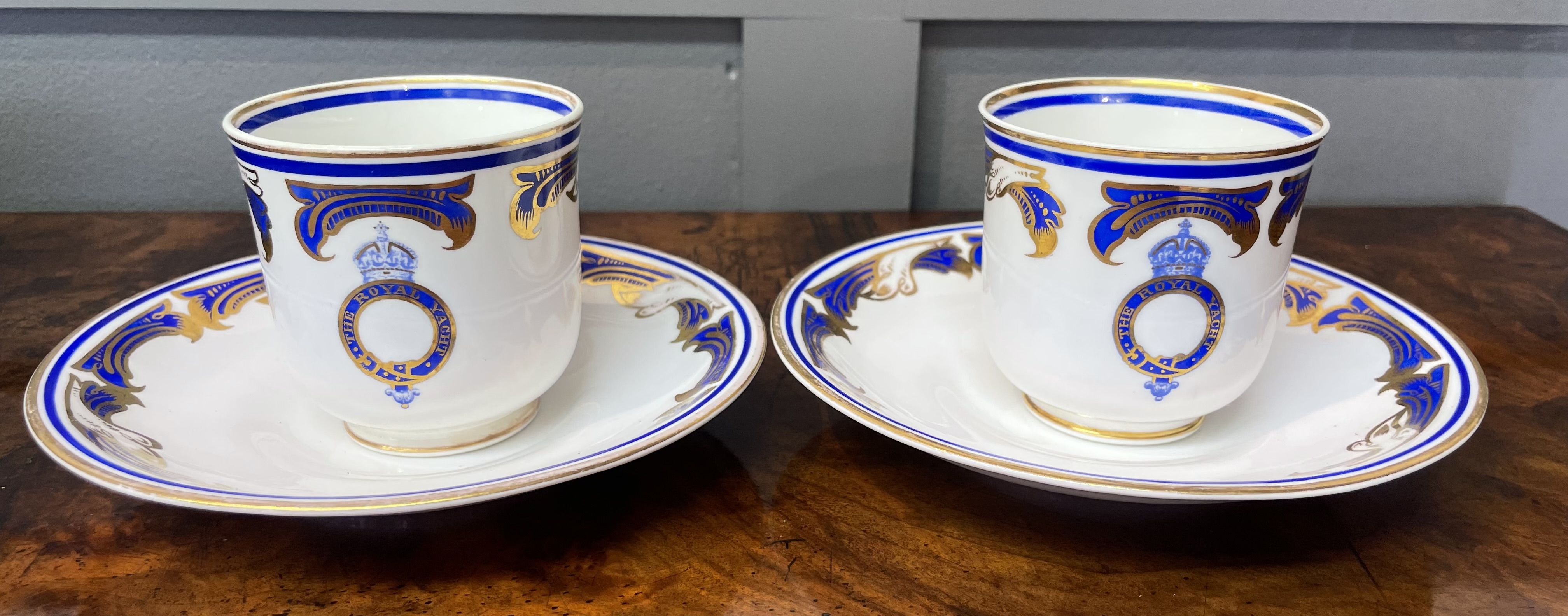 A Pair of W.T. Copeland and Sons Royal Yacht Service Porcelain Cups and Saucers