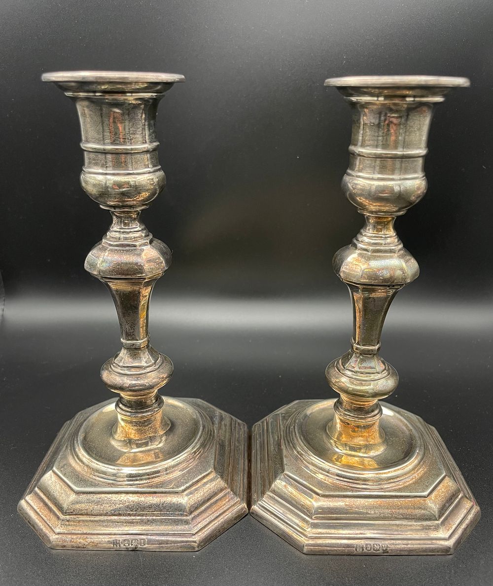 Lot 150 – A Pair of English Sterling Silver Queen Anne Style Candlesticks by Thomas Bradbury and Sons