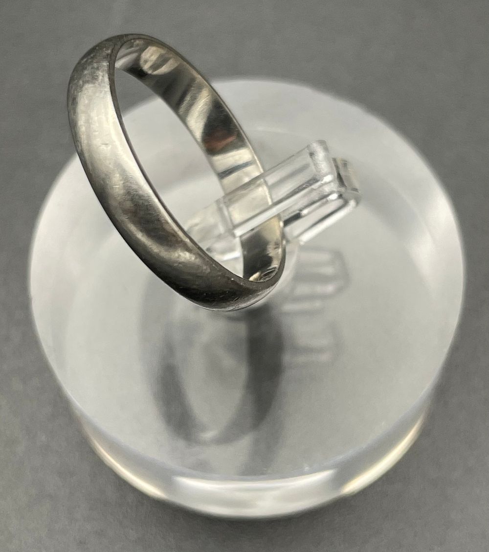 Lot 100 – Platinum and 14 Karat Gold Band Ring