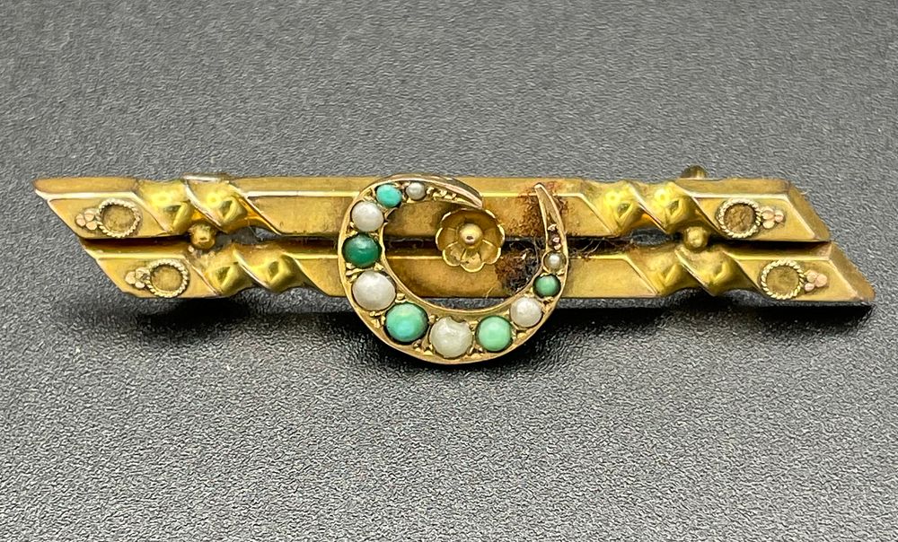 Lot 106 – Victorian 9 Karat Gold Seed Pearl and Turquoise Crescent Moon Bar Brooch