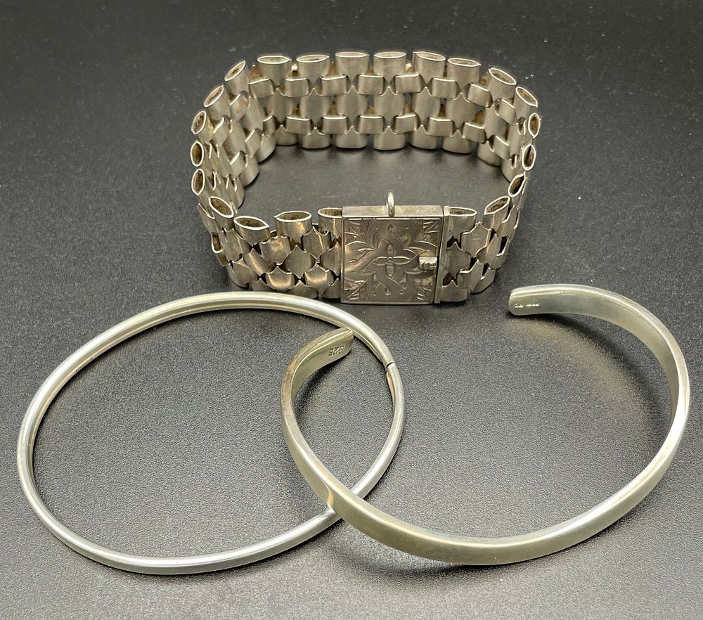Lot 108 – Three Sterling Silver Bracelets Including Articulated Link and Bangle Styles