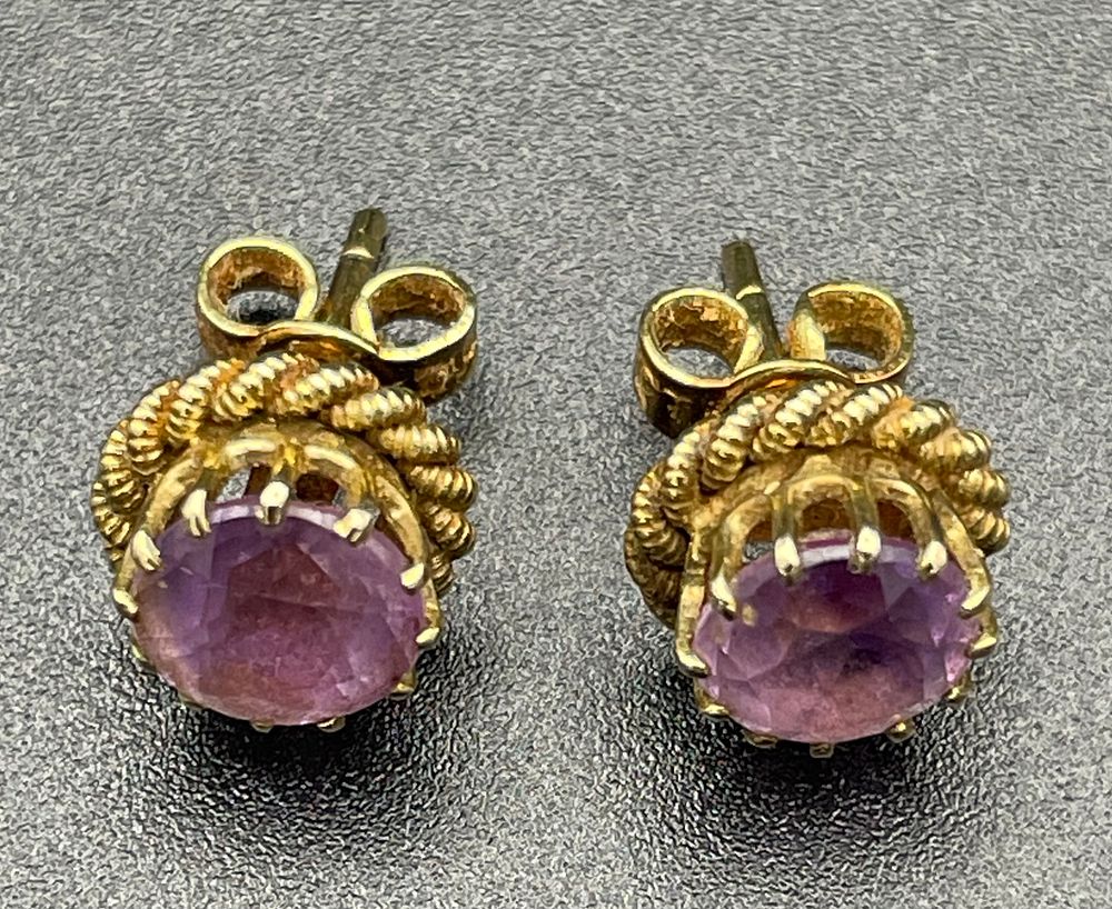 Lot 114 – A Pair of Yellow Metal and Amethyst Stud Earrings