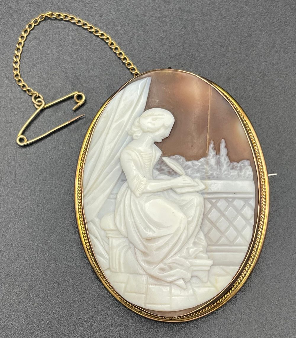 Lot 116 – Victorian 9 Karat Yellow Gold and Carved Shell Cameo Brooch Featuring a Seated Woman Writing