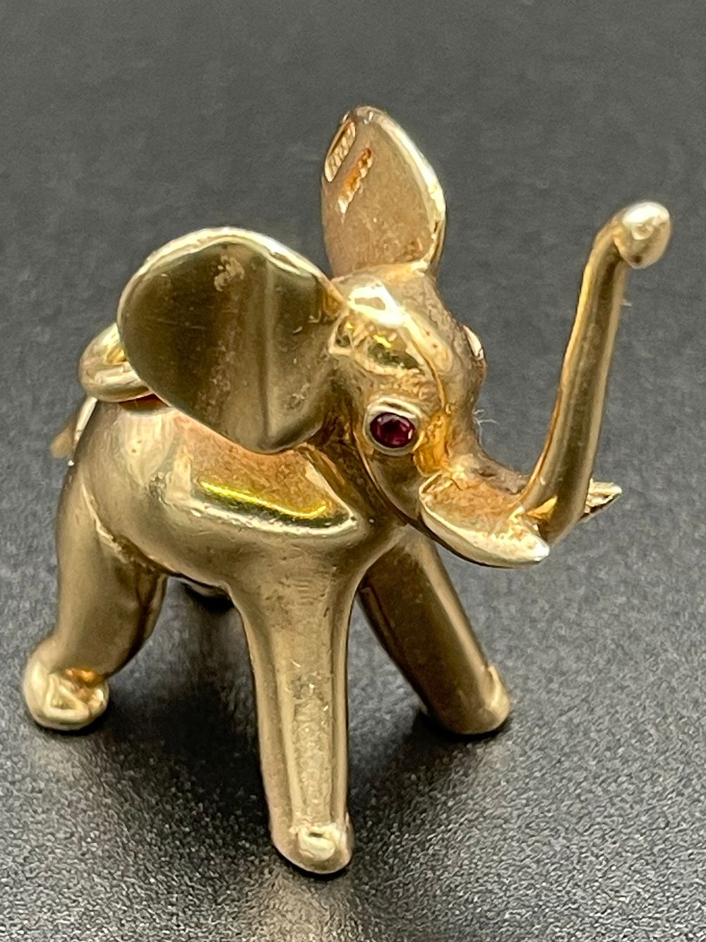 Lot 127 – 14 Karat Yellow Gold Elephant Charm with Ruby Eyes