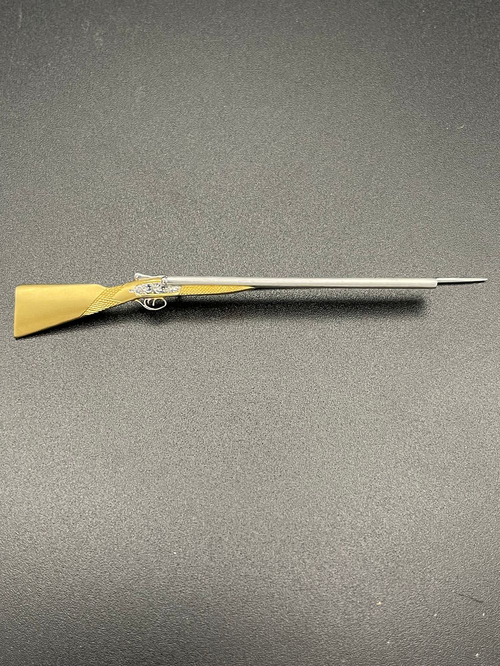 Lot 138 – 15 Karat Two Tone Gold and Silver Double Barrel Shotgun Novelty Stock Pin