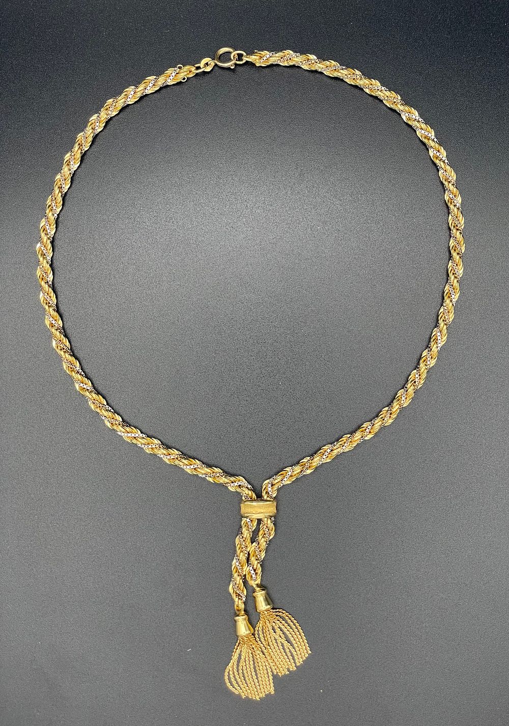 Lot 144 – Two-Tone 18K Gold Lariat Tassel Necklace