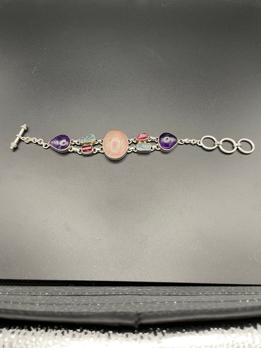 Lot 148 – Multi-Gemstone Sterling Silver Link Bracelet