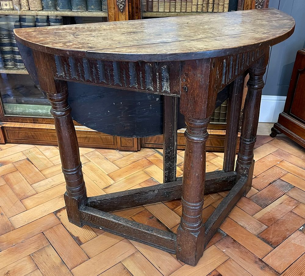 Lot 175 – A 17th Century Credence Table With Drop Down Side