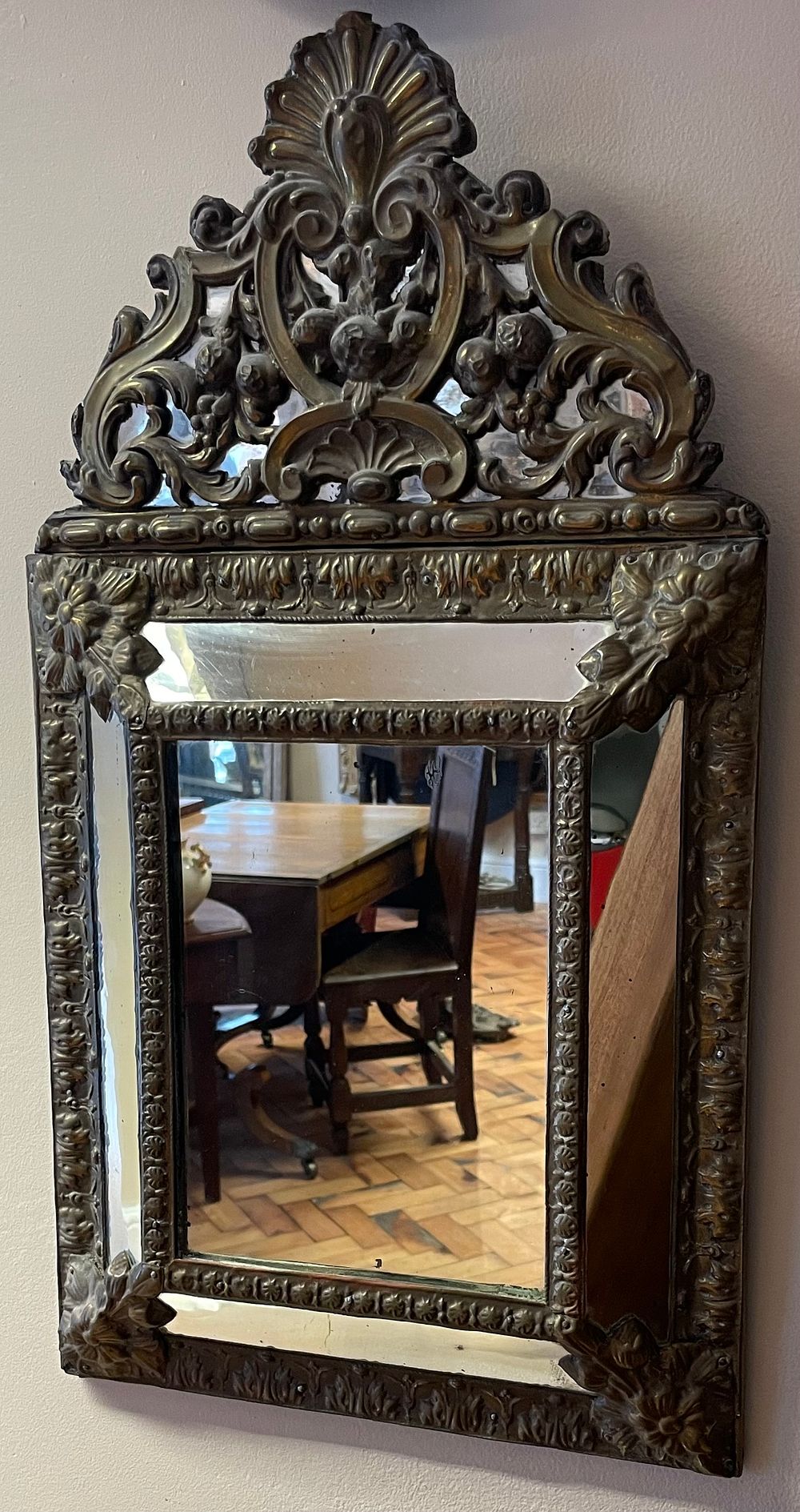Lot 252 – Dutch Baroque Style Brass Repousse Cushion Mirror