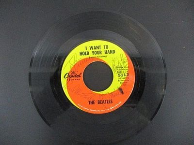The Beatles Signed 45 RPM Record "I Want to Hold Your Hand" with Certificate of Authenticity.A 