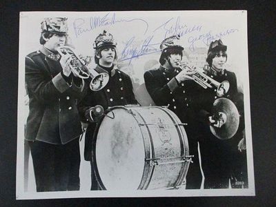 The Beatles Signed Photo Marching Band Players. The Beatles Signed Photograph - Dressed as 