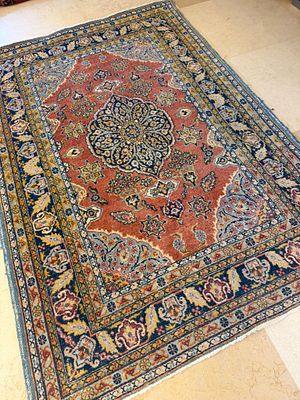 שטיח תבריז פרסי עבודת יד. 130X190 ס"מ. עתיק . לאחר ניקוי אצל ארגמן חברה לניקוי שטיחים.