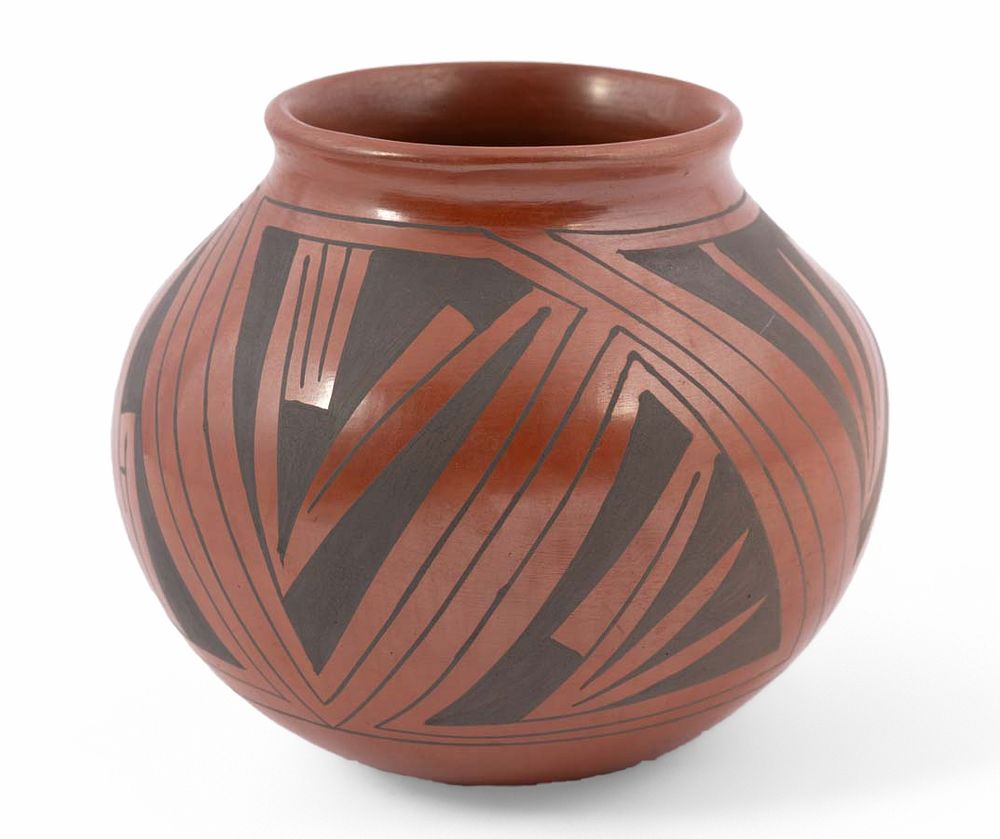 Native American Pottery Vase by Jose Mora . A beautiful Native American hand-made vase signed 