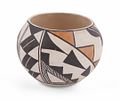 Two Handmade Native American Pottery Bowls. A pairing of two Native American pottery bowls from Image - 2