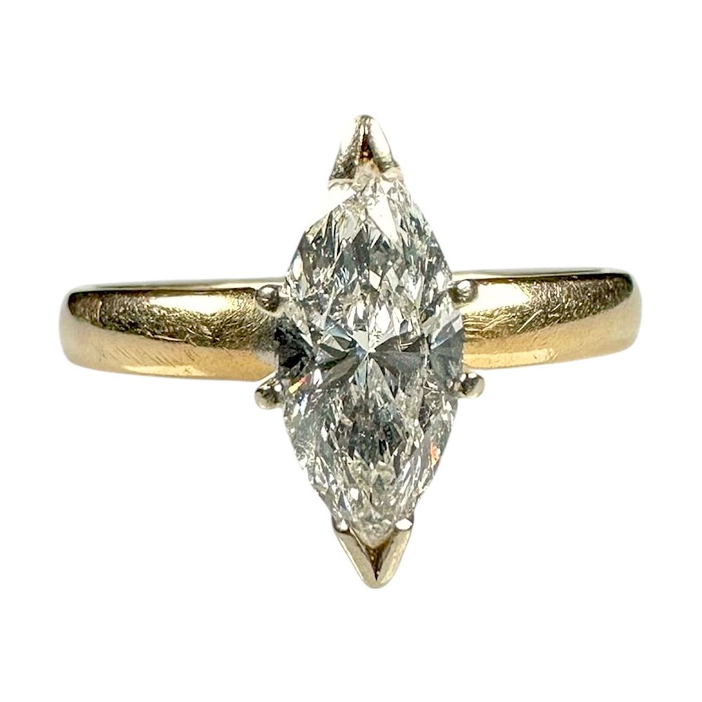 Ladies Vintage 14k Yellow Gold Ring with One .75 Carat Marquise Diamond
. Ladies Vintage 14k 