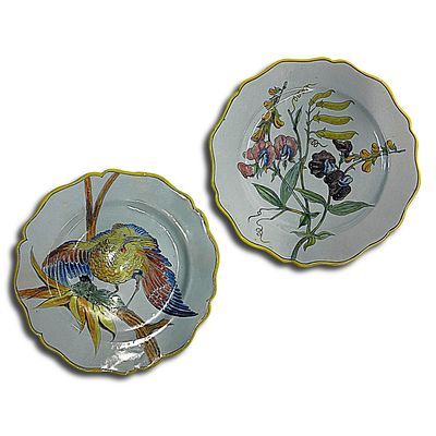 Pair of French Faience Quimper Plates marked with DB Monogram on one. The plates have yellow 