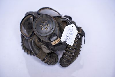 World War II US Navy Gas Mask Mark IV with Canister. The product is a WW II 1944 USN MK-IV Mark 