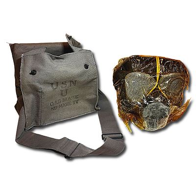 World War II US Navy Gas Mask Mark IV with Canister and Original Bag. The product is a WW II 