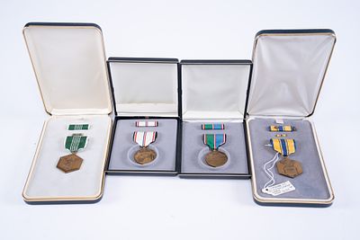 Collection of 4 Military Medals - Vietnam, D Day, Battle of the Bulge. A group of military 