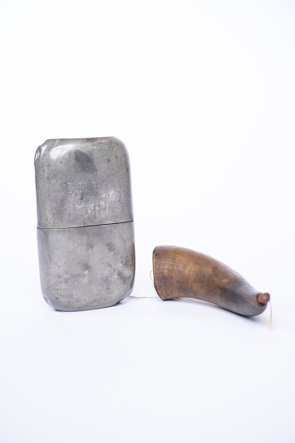 Pair of Civil War Militaria. 1 1860s Powder Horn, and 1 Pewter Surgeon's Flask inscribed F.M. 
