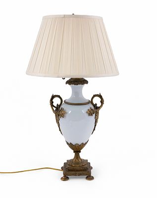 White Bisque Neoclassical Style Lamp. A white glass and Gilt bronze neo-classical style 