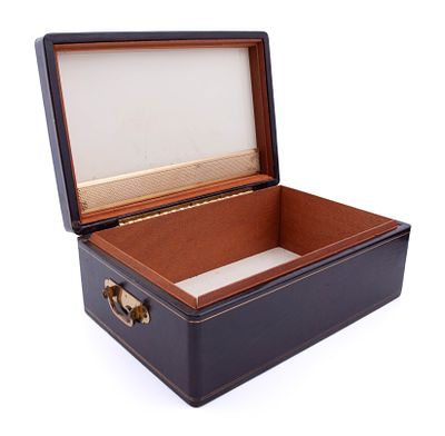 Vintage Leather and Wood Tea Box. Vintage tea box in wood lined with leather decorated with gold 