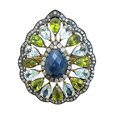 Teardrop Shaped Silver Gilt Ring with Large Blue Sapphire. A large teardrop-shaped silver gilt 