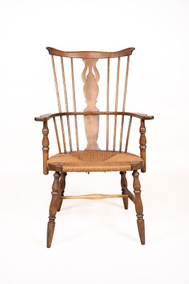Vintage Splat Back Rush Seat Windsor Arm Chair. This chair is made in the antique English 