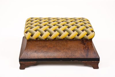 Vintage Burl wood Foot Stool with Geometric Upholstery. The pattern of the upholstery is a 