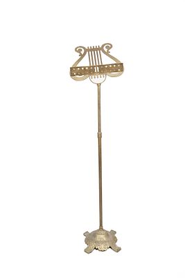 Vintage Brass Music Stand. Harp/lyre design. Floral designs on shelf. Base has feet and ornate 