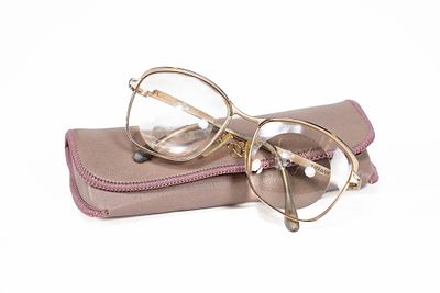 Vintage Tiffany Gold Eye Glasses. Marked Tiffany on left arm and Buris 130 mm on right arm. 