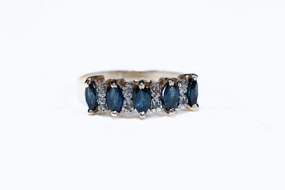Ladies Vintage Sapphire and Diamond Ring. 5 blue sapphires and 8 diamonds. 14 kt yellow gold 