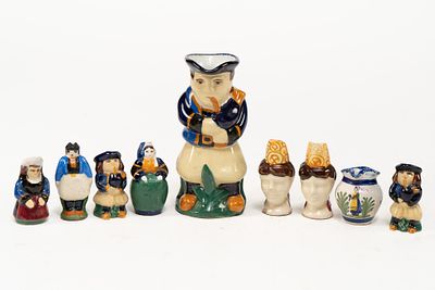 Lot of 9 Assorted French Faience Creamer Pitchers. 1 man pitcher signed France on bottom. 1 