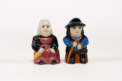 French Faience Henriot Quimper Figural Salt and Pepper Shakers. Man has one hole on top and 