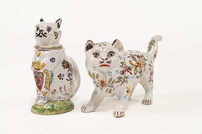 Pair of French Faience Cat Figures. 1 standing cat figure with painted flower and leaf designs 