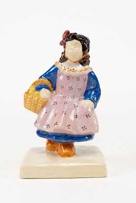 French Faience Henriot Quimper Sevellec Girl with Basket Figure. Depicts a girl in a blue dress 
