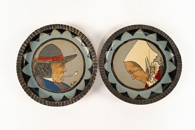 Pair of French Quimper Fouillen Woodenware Plates. Plates have etched and painted designs of an 