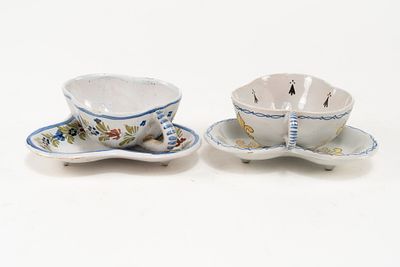 Pair of French Faience HB Quimper Trefoil Shape Cup and Dish Sets. One set has a Breton woman 