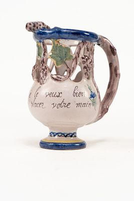 French Faience PBx Quimper Decorative Pitcher. Pitcher with sculpted and painted grapes and 