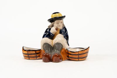French Faience HB Quimper Double Salt Holder. Depicts a man sitting and holding a cigar with a 