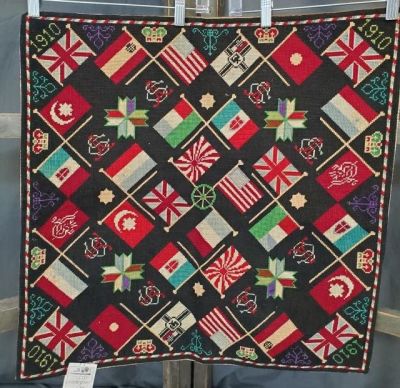 Antique 1910 Needlepoint - Worldly Flags. Antique 1910 hand worked needlepoint, perfect for a 