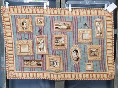 Antique Needlework of a Portrait Gallery. Antique needlepoint embroidery of a portrait gallery 