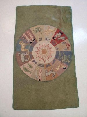 Vintage Zodiac Folk Art Hooked Rug. Vintage astrological zodiac folk art hooked rug. Measures 35 