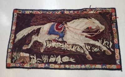 Vintage Folk Art Hooked Rug Horse. Vintage folk art hooked rug depicting a galloping horse. 