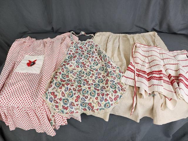Lot 188: 4 Vintage Aprons