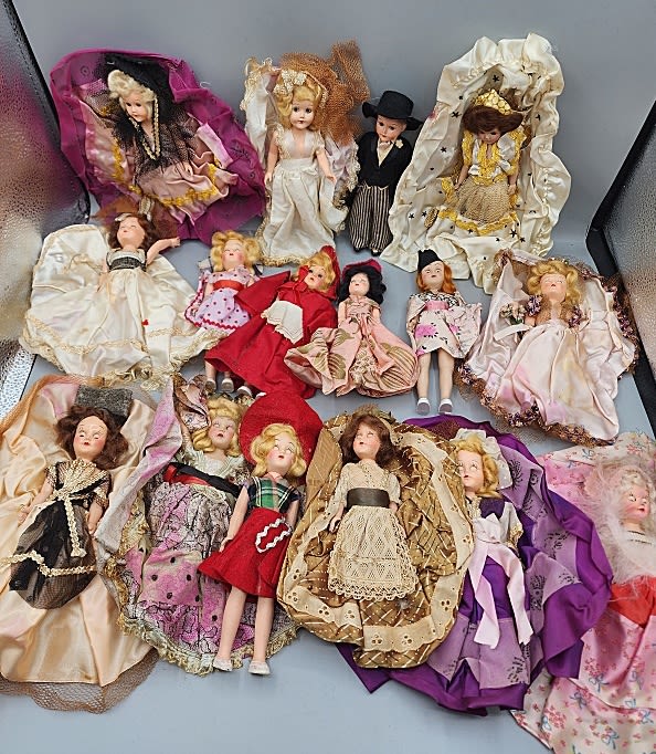 Lot 178: 16 Vintage Plastic Dolls in Costumes