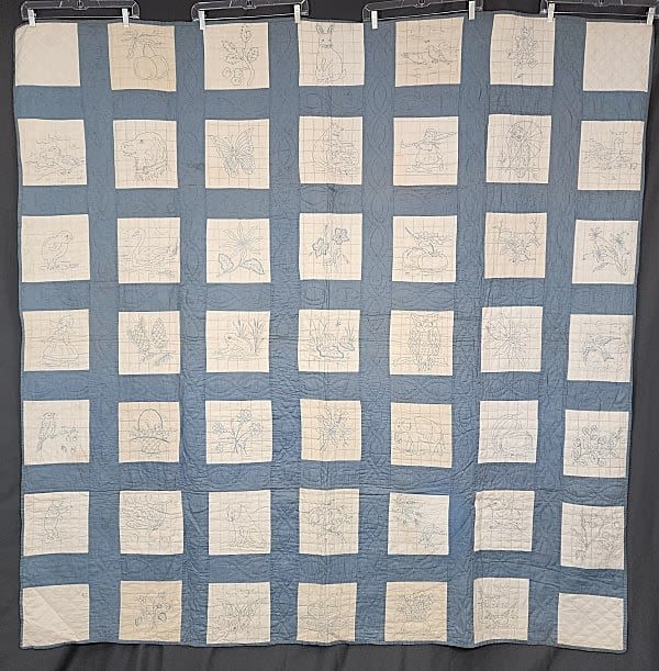 Lot 160: Vintage c1940 Blue Work Embroidered Quilt