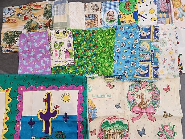 Lot 191: 8lbs of Quilt Fabric- Child Theme Animals More