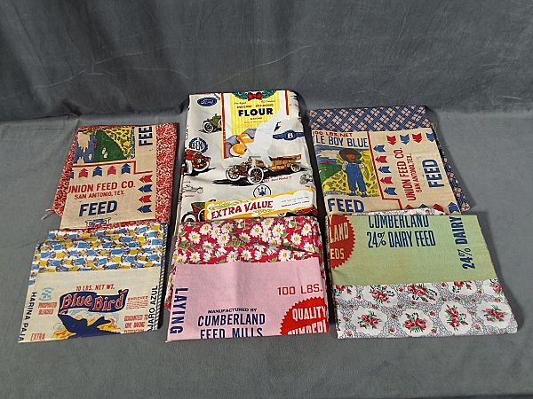 Lot 201: 6 Vintage Feedsacks with Labels